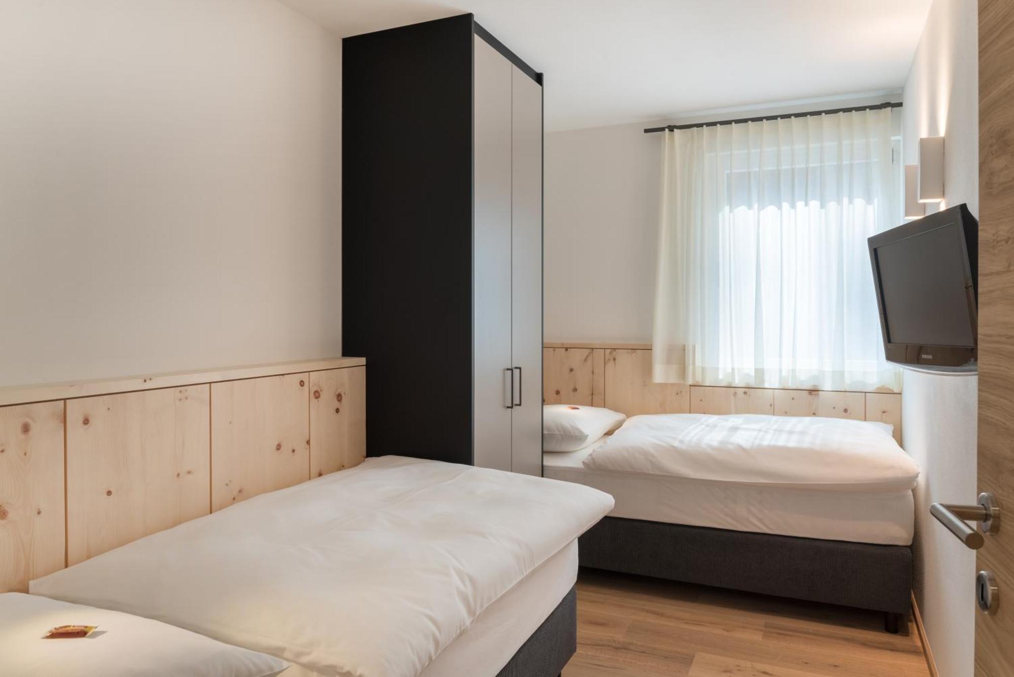 Alpenwellnesshotel St. Veit Sexten Habitación foto